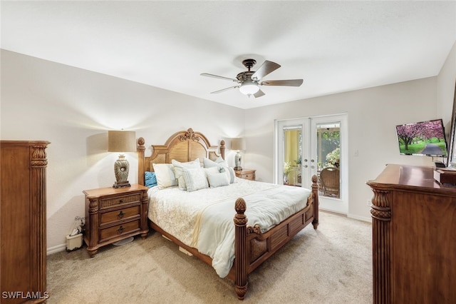 carpeted bedroom featuring access to exterior, french doors, and ceiling fan