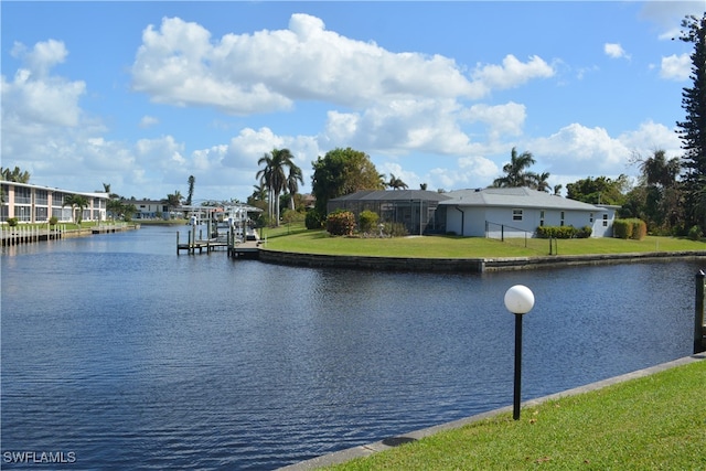 property view of water with a dock