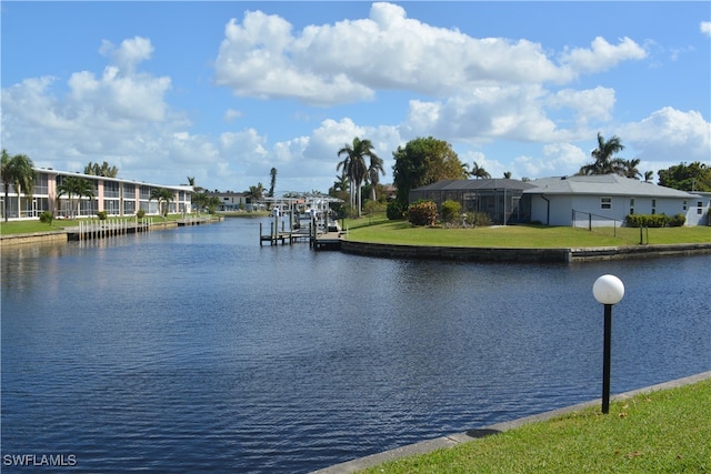 property view of water with a dock