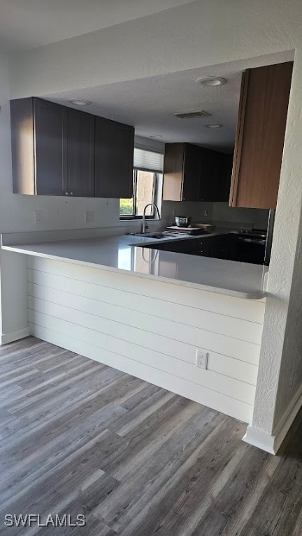 kitchen with dark hardwood / wood-style floors