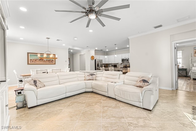 tiled living room featuring crown molding and ceiling fan