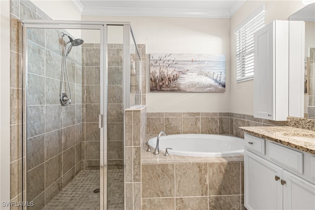 bathroom with vanity, crown molding, and plus walk in shower