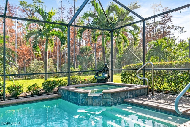 view of pool with an in ground hot tub and a lanai