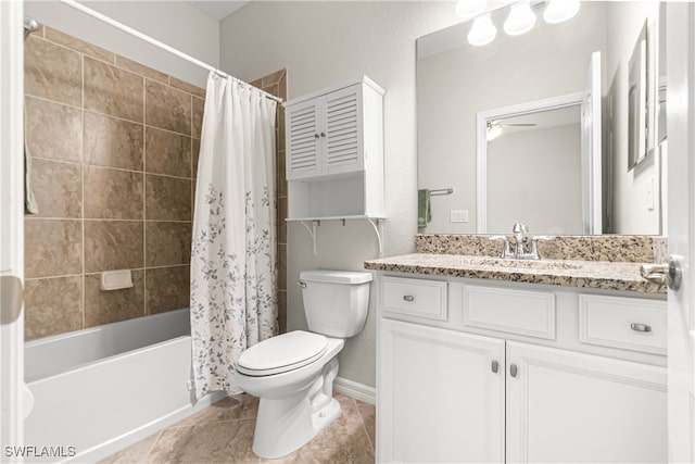 full bathroom with shower / bath combination with curtain, toilet, ceiling fan, tile patterned floors, and vanity