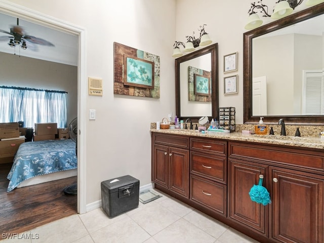 bathroom featuring vanity, ceiling fan, and tile patterned floors