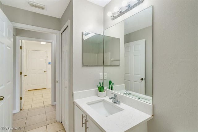 bathroom featuring vanity and tile patterned floors