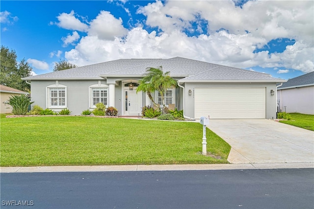 ranch-style house featuring a front lawn and a garage