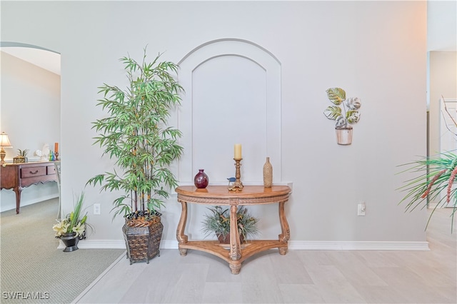 interior details featuring hardwood / wood-style flooring