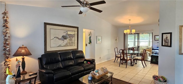 tiled living room featuring ceiling fan with notable chandelier and lofted ceiling