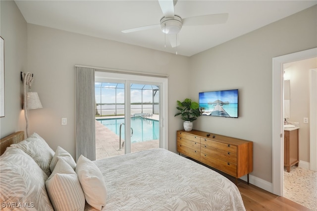 bedroom with access to outside, light hardwood / wood-style flooring, ensuite bath, and ceiling fan