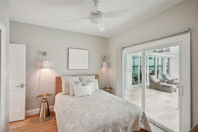 bedroom featuring light wood-type flooring, access to outside, and ceiling fan