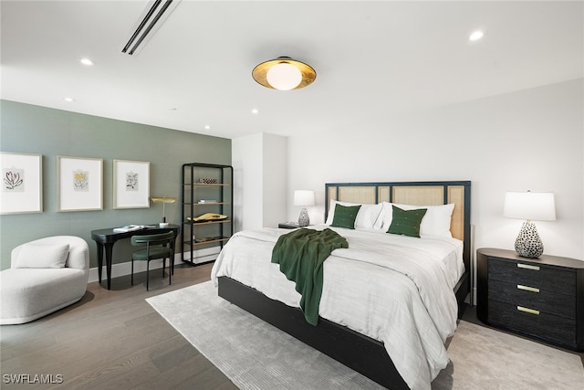 bedroom featuring light hardwood / wood-style floors