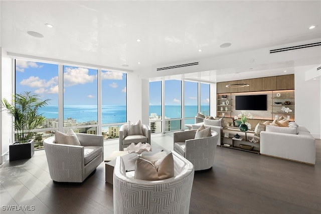 living room featuring floor to ceiling windows and dark hardwood / wood-style flooring