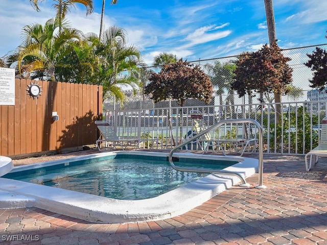 view of pool featuring a patio area