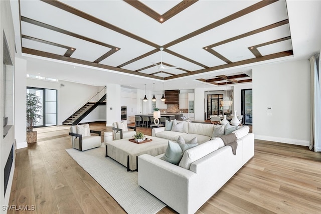 living room with light hardwood / wood-style flooring