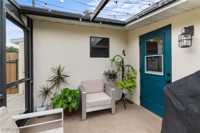 property entrance with a patio area