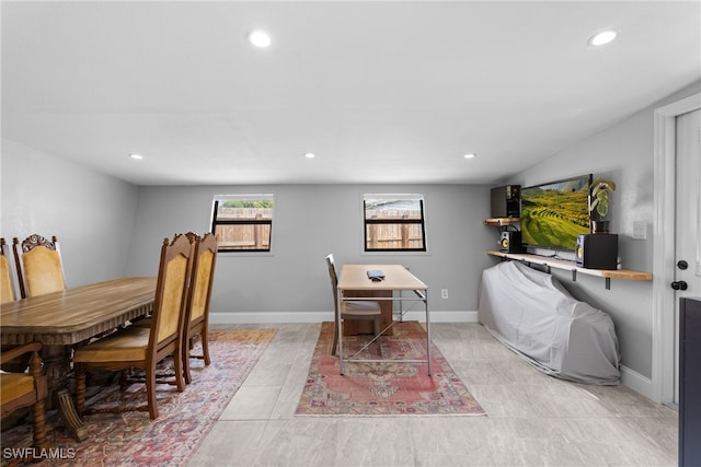 dining room featuring light tile patterned flooring