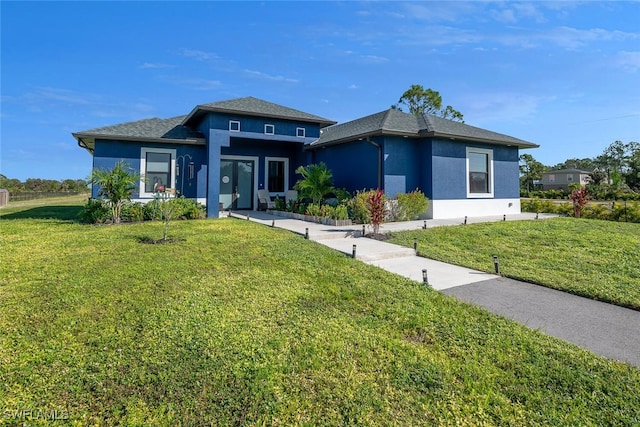 view of front facade with a front yard