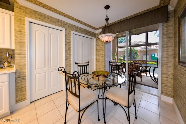 dining area with light tile patterned floors