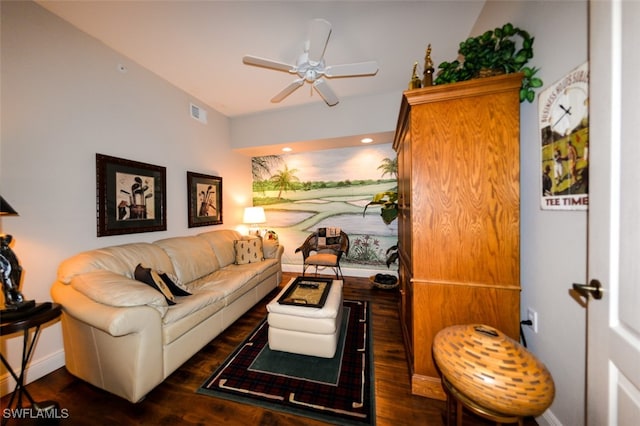 living room with ceiling fan and dark hardwood / wood-style floors