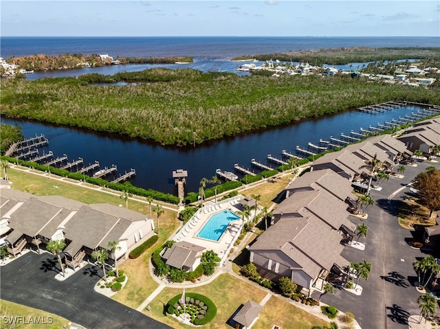 birds eye view of property featuring a water view