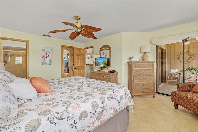 bedroom featuring light tile patterned floors and ceiling fan