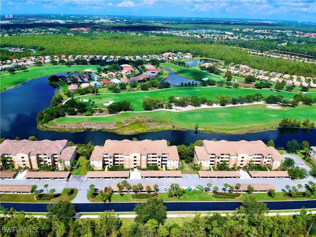 drone / aerial view with a water view