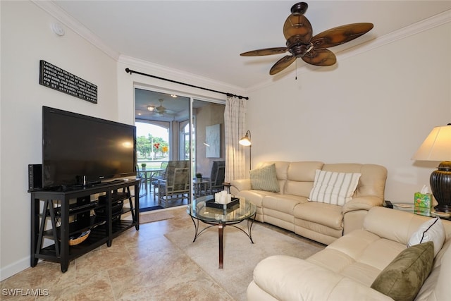 living room with ornamental molding and ceiling fan