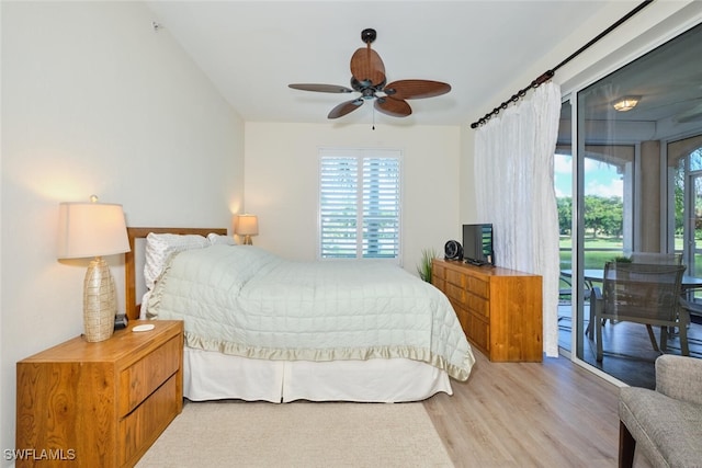 bedroom with light hardwood / wood-style flooring, multiple windows, access to exterior, and ceiling fan