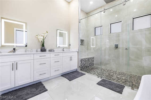 bathroom with vanity and an enclosed shower