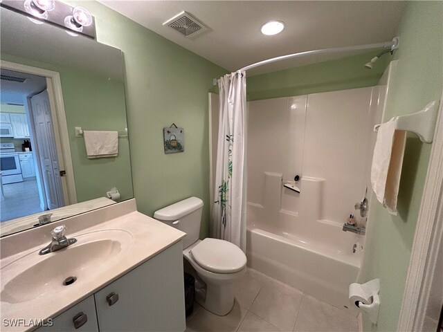 full bathroom with vanity, toilet, shower / bath combo, and tile patterned flooring