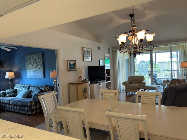 dining room with vaulted ceiling, a notable chandelier, and dark hardwood / wood-style floors