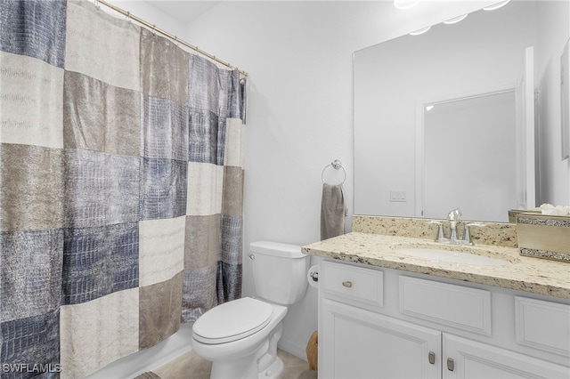 bathroom with toilet, vanity, a shower with shower curtain, and tile patterned flooring