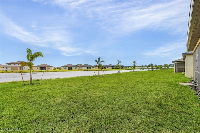 view of yard with a water view