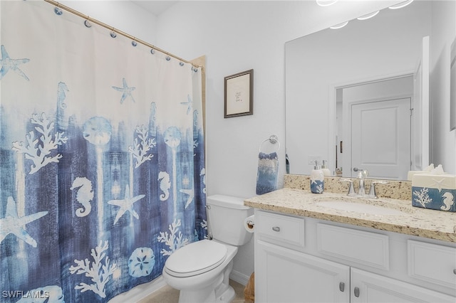 bathroom featuring vanity, toilet, and a shower with shower curtain