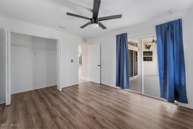 unfurnished bedroom with hardwood / wood-style flooring and ceiling fan