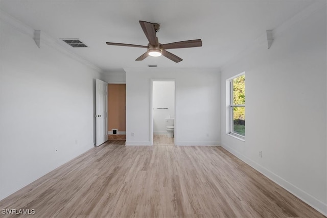 unfurnished bedroom with ensuite bath, ceiling fan, light hardwood / wood-style flooring, and crown molding