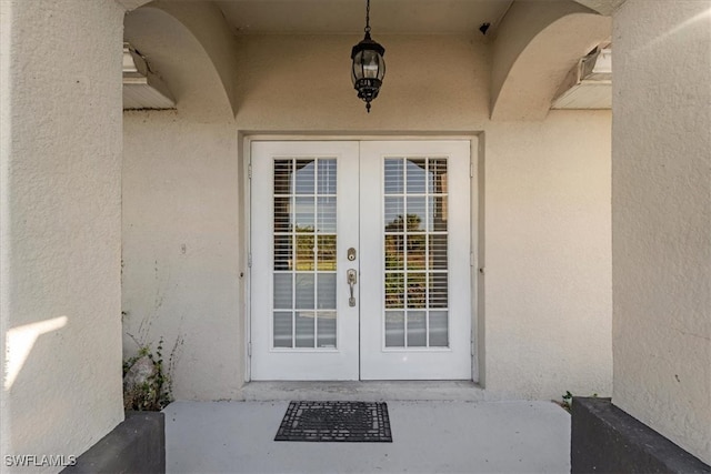 view of exterior entry with french doors