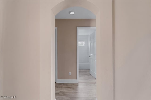 corridor featuring light hardwood / wood-style flooring