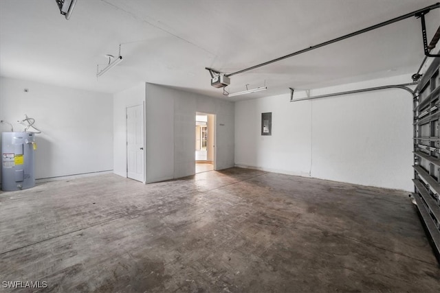 garage featuring electric water heater and a garage door opener