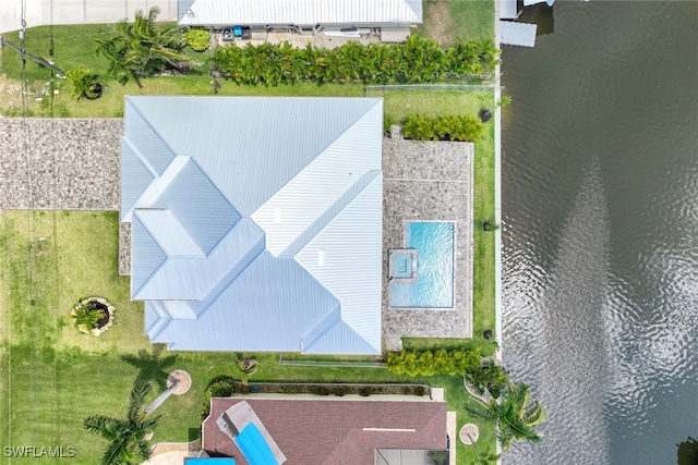 drone / aerial view with a water view