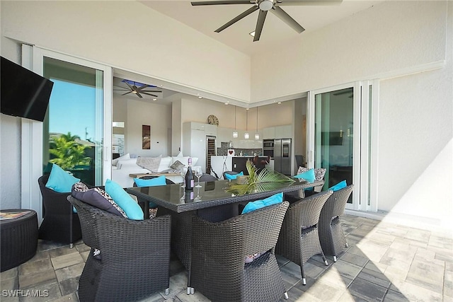 view of patio with ceiling fan