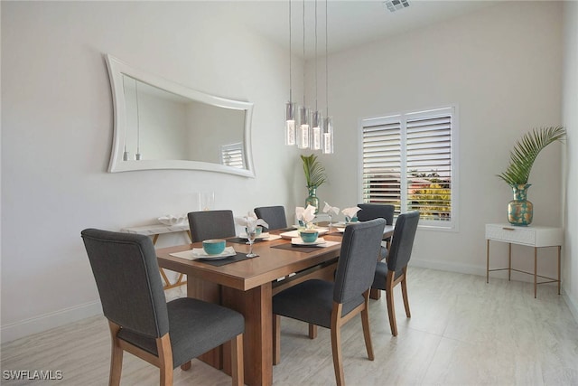 dining room featuring light wood-type flooring