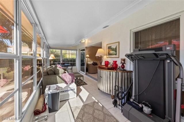 39 Glades Blvd Unit 1, Naples, FL 34112 - sunroom featuring tile patterned flooring