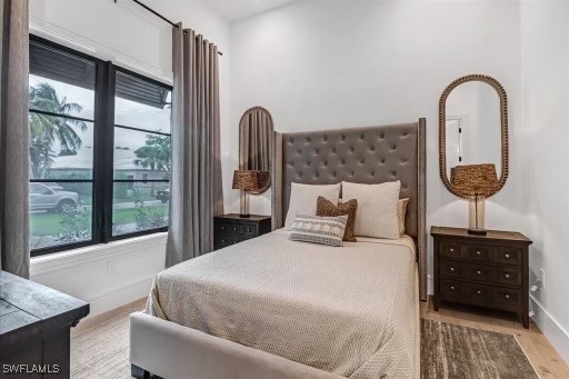 bedroom featuring light wood-type flooring