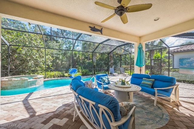 view of patio / terrace with a swimming pool with hot tub, ceiling fan, and glass enclosure