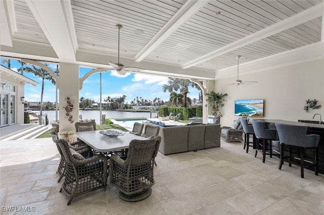 view of patio with an outdoor pool, exterior bar, ceiling fan, outdoor dining area, and an outdoor living space