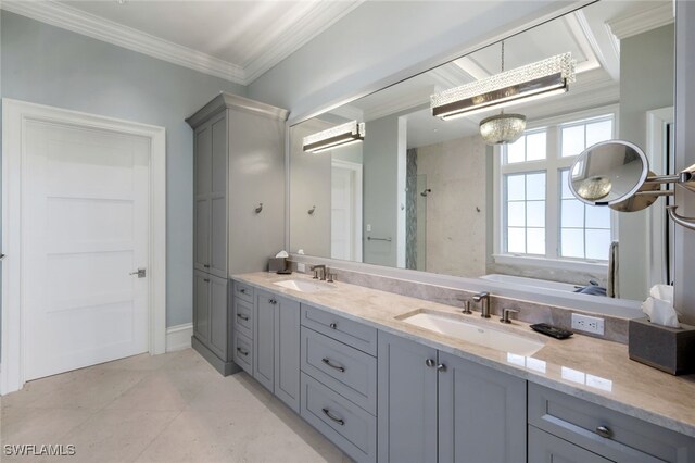 bathroom with vanity, crown molding, a shower with shower door, and a chandelier