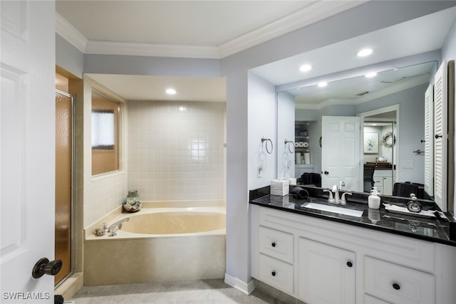 bathroom with vanity, crown molding, and independent shower and bath