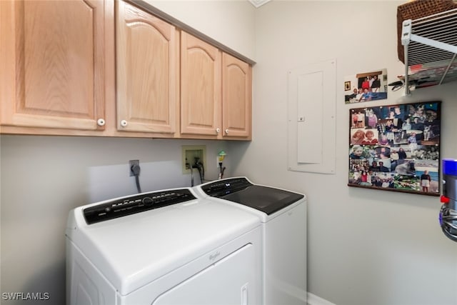 laundry area with cabinets and washer and dryer